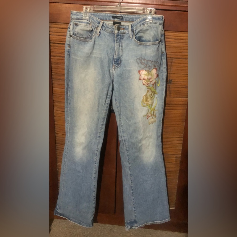 Jeans with embroidery very comfortable. Hardly worn in excellent condition.